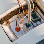 water heater shows the rust and water damage