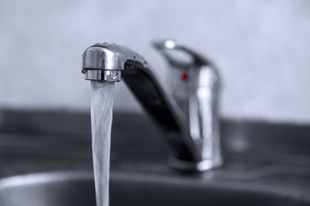 Water flows from the tap