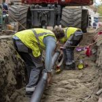 plumbing team repairing a sewer line